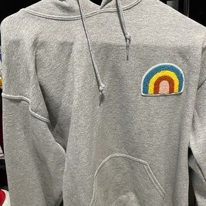 Grey sweatshirt with rainbow patch